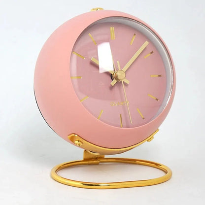 Minimalist Scandinavian design silent alarm clock featuring luminous hands and silent quartz movement, perfect for a peaceful sleep environment. 1