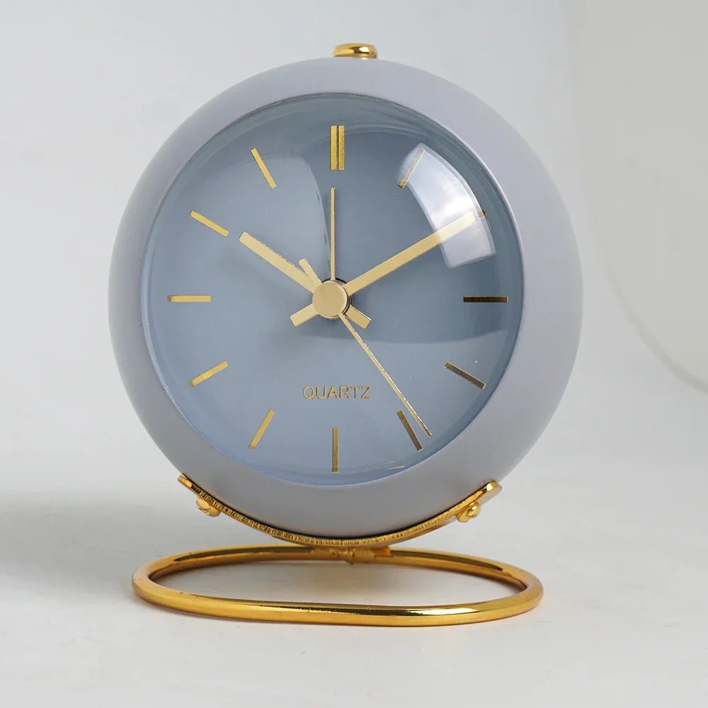 Minimalist Scandinavian design silent alarm clock featuring luminous hands and silent quartz movement, perfect for a peaceful sleep environment. 2
