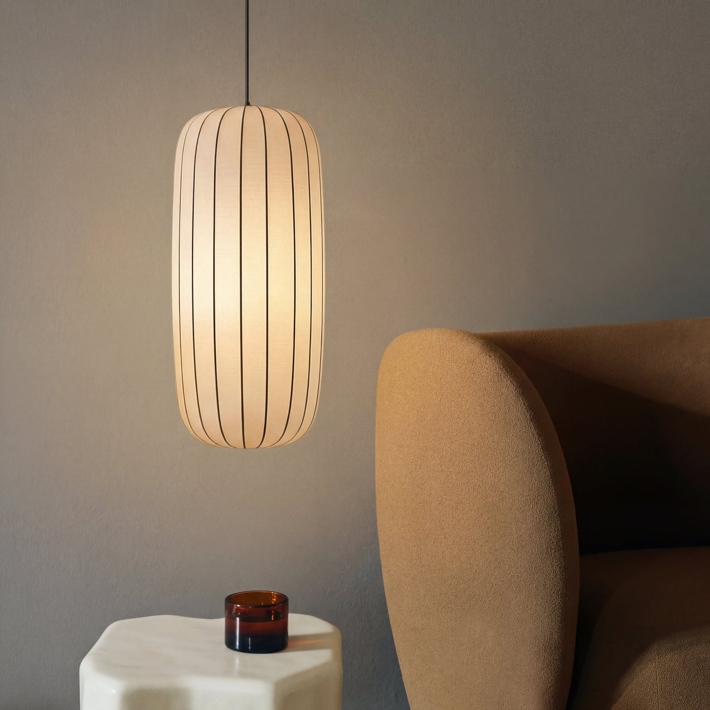 Silk hanging lamp with adjustable height featuring a warm LED glow, designed in a minimalist style for elegant kitchen pendant lighting. 1