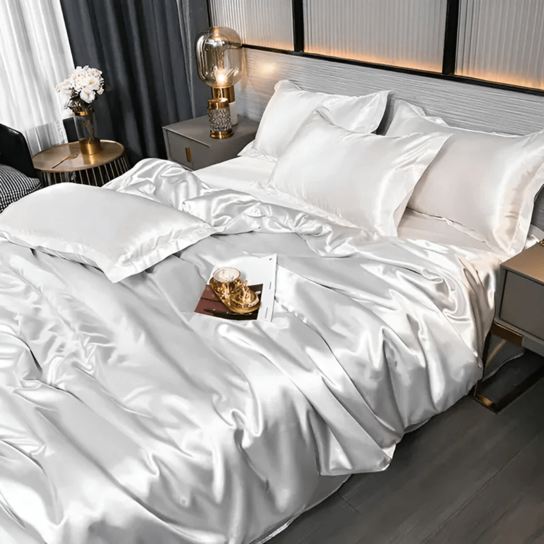 Silk-look bedding set featuring a stylish duvet cover and two matching pillowcases, made from breathable polyester for a luxurious and comfortable sleep experience. 5