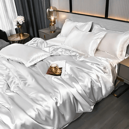 Silk-look bedding set featuring a stylish duvet cover and two matching pillowcases, made from breathable polyester for a luxurious and comfortable sleep experience. 5