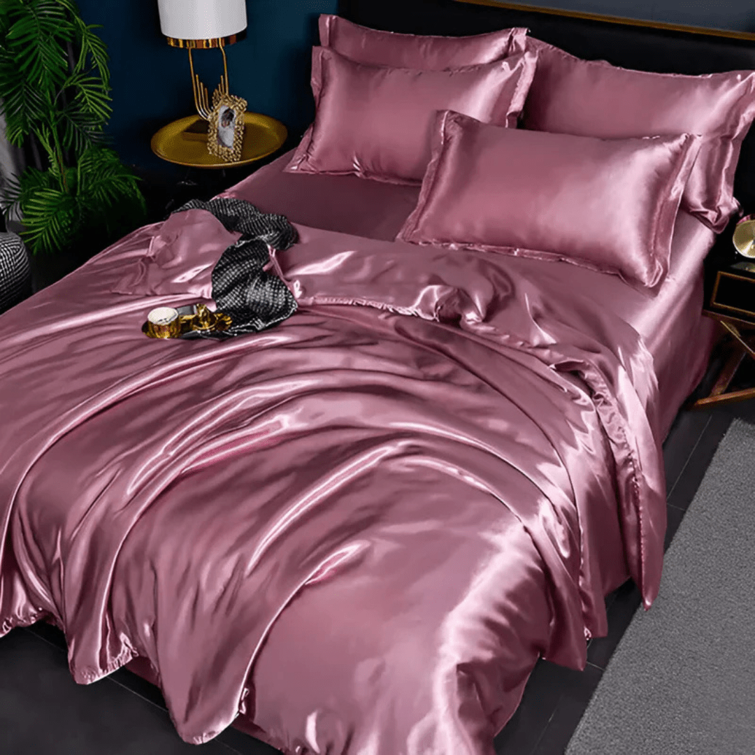 Silk-look bedding set featuring a stylish duvet cover and two matching pillowcases, made from breathable polyester for a luxurious and comfortable sleep experience. 4