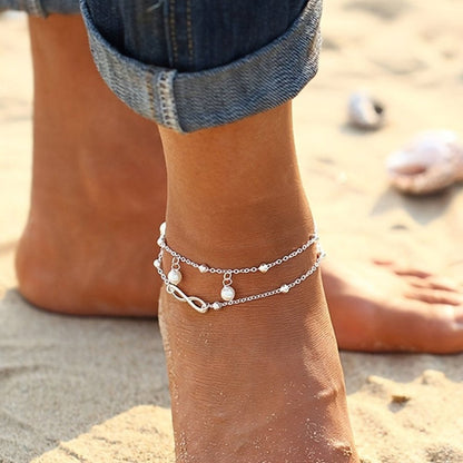Silver anklet featuring a layered boho beaded design with an extender, perfect for summer wear and stylish for women. 4