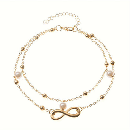 Silver anklet featuring a layered boho beaded design with an extender, perfect for summer wear and stylish for women. 1
