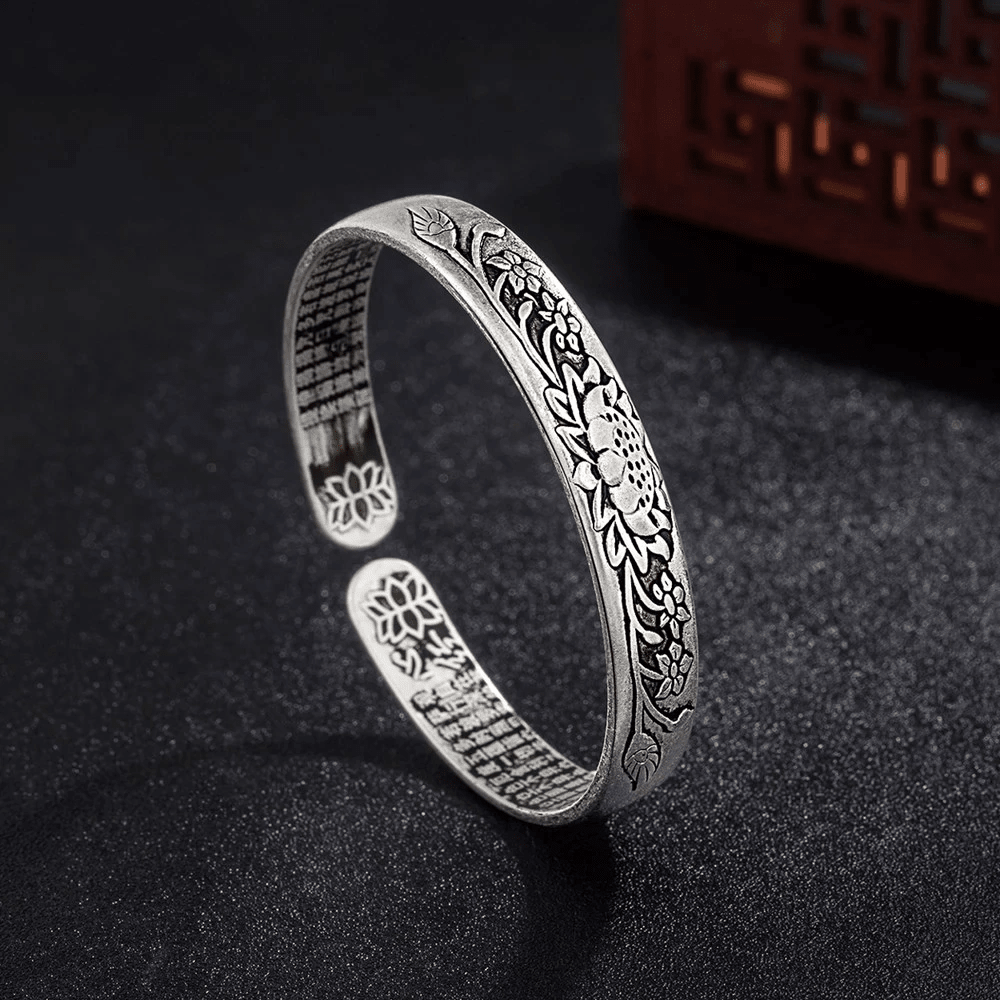 Silver Lotus Bracelet featuring an adjustable design, crafted from hypoallergenic S925 silver, suitable for unisex wear. 2