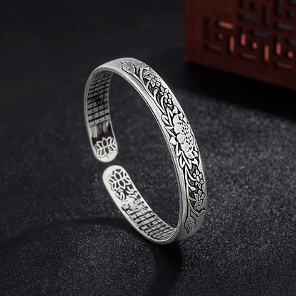 Silver Lotus Bracelet featuring an adjustable design, crafted from hypoallergenic S925 silver, suitable for unisex wear. 2