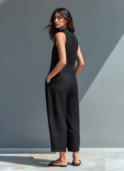 Sleeveless jumpsuit with a mandarin collar made from lightweight, breathable fabric, perfect for an elegant and stylish look. 2
