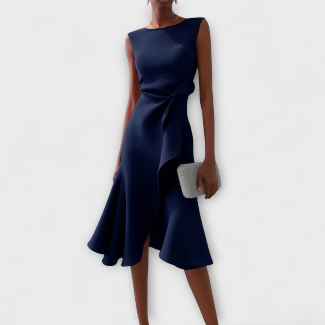 Elegant sleeveless midi dress featuring a stylish knot detail and soft drape, complemented by a flattering flared skirt, perfect for any occasion. 2