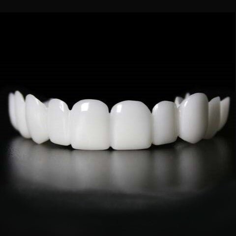 Snap-On Veneers for an Instant Smile Enhancement featuring a Natural Look, made from Comfortable Fit Medical-Grade Polypropylene for a seamless appearance. 2