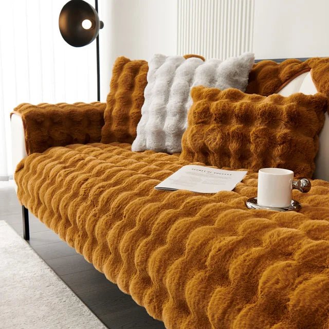 Sofa cover featuring an anti-slip design and pet-resistant material, made from durable washable fabric suitable for all sofa types. 4
