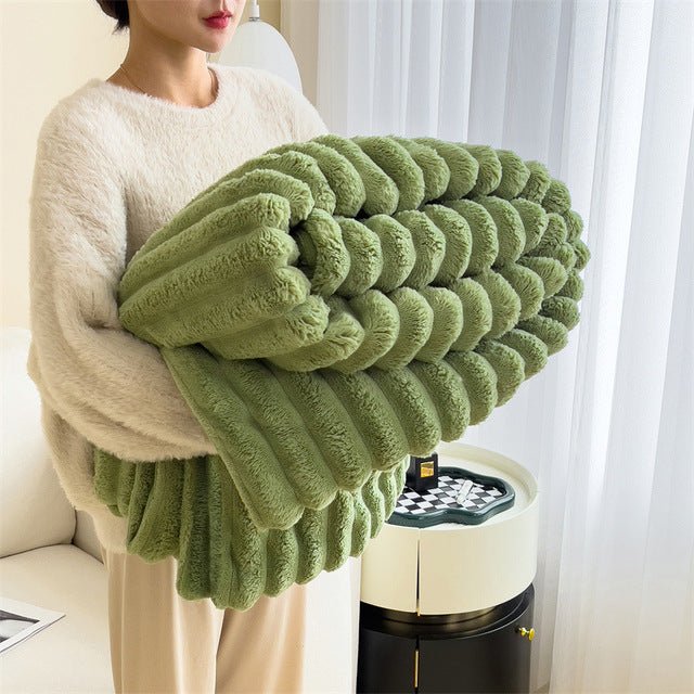 Soft faux fur blanket in a cozy living room setting, showcasing its lightweight design and luxurious texture, perfect for home decor and easy washing. 2