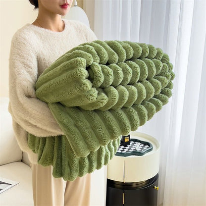 Soft faux fur blanket in a cozy living room setting, showcasing its lightweight design and luxurious texture, perfect for home decor and easy washing. 2