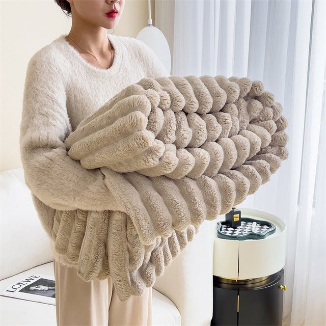 Soft faux fur blanket in a cozy living room setting, showcasing its lightweight design and luxurious texture, perfect for home decor and easy washing. 3