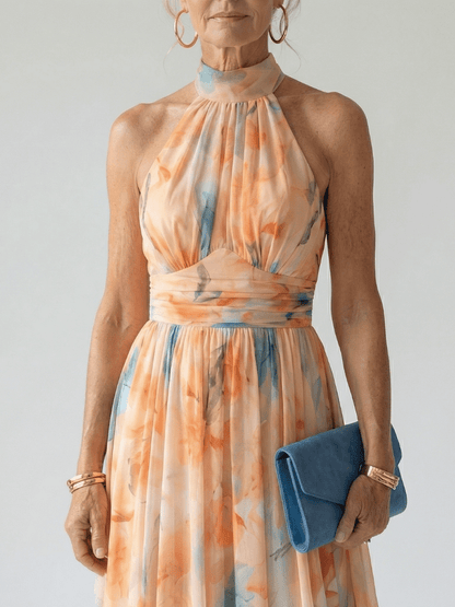 Soft halter midi dress with gathered bodice in lightweight white fabric, perfect for summer wear for women. 1