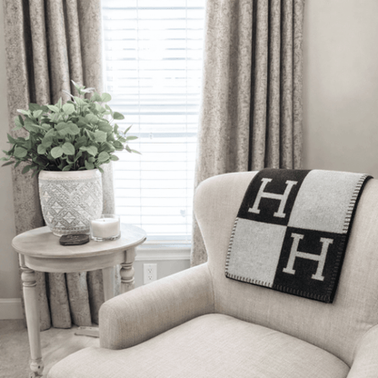 Soft throw blanket featuring a modern design, perfect for adding a cozy touch to any home decor, lightweight and ideal for snuggling up on the couch. 1