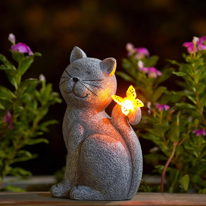 Hand-painted solar garden cat statue featuring a butterfly light, perfect for adding charm and illumination to your outdoor space. 0