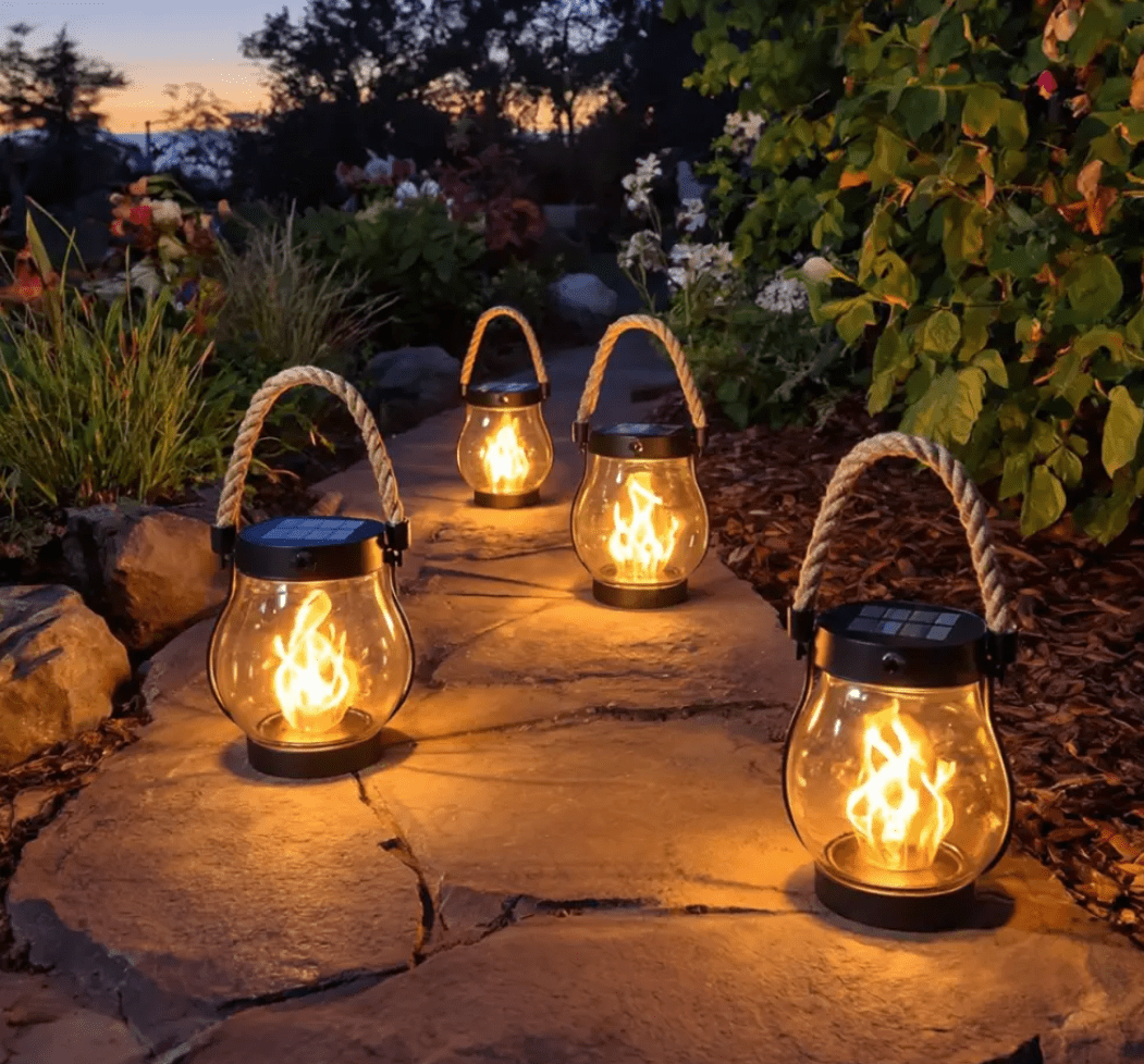 Solar garden light featuring a realistic flame effect, designed for outdoor use with automatic dusk activation and a weatherproof construction. 7