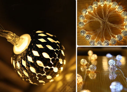 Solar garden lights garland featuring LED spherical lanterns in a Moroccan style, ideal for outdoor decoration, showcasing intricate metal designs that enhance your garden ambiance. 5