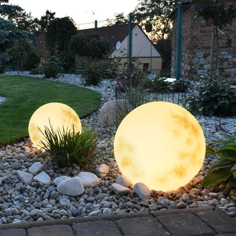 Solar garden lights featuring a unique LED moon design, perfect for eco-friendly outdoor lighting in paths and gardens. 1