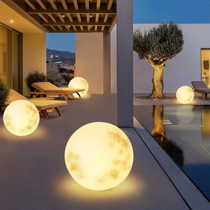 Solar garden lights featuring a unique LED moon design, perfect for eco-friendly outdoor lighting in paths and gardens. 2