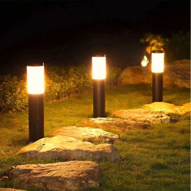Solar garden lights with warm LED illumination in a sleek black design, perfect for outdoor pathway lighting; set of 2 enhances garden aesthetics and provides safety at 0