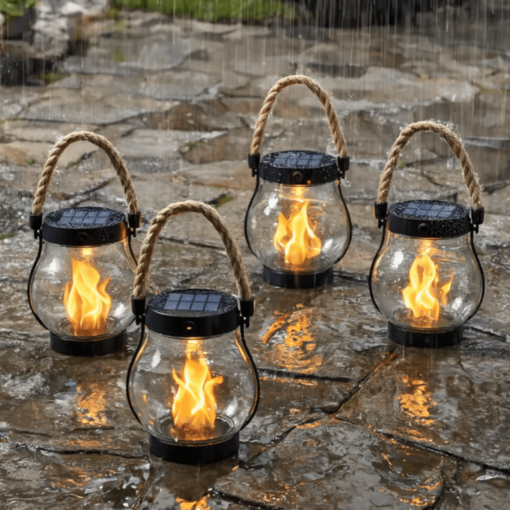 Solar hanging lantern with flame effect, designed for outdoor use, waterproof construction, perfect for enhancing garden ambiance at night. 1