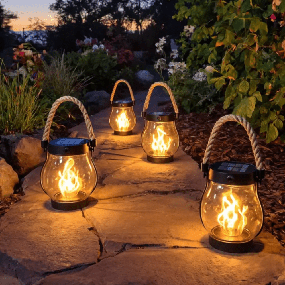 Solar hanging lantern with flame effect, designed for outdoor use, waterproof construction, perfect for enhancing garden ambiance at night. 2