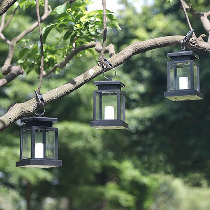 Solar hanging lantern featuring a realistic LED candle effect, perfect for adding a classic touch to outdoor spaces while providing eco-friendly illumination. 2