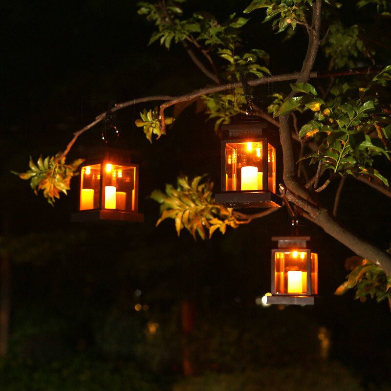 Solar hanging lantern featuring a realistic LED candle effect, perfect for adding a classic touch to outdoor spaces while providing eco-friendly illumination. 0