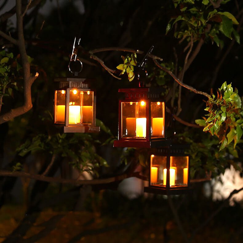 Solar hanging lantern featuring a realistic LED candle effect, perfect for adding a classic touch to outdoor spaces while providing eco-friendly illumination. 1