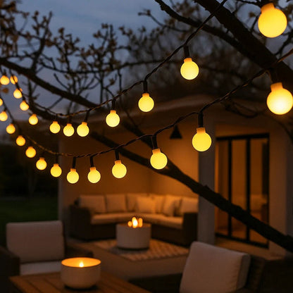 Solar LED string lights with automatic sensor, 10m length, waterproof design for outdoor garden decor, featuring warm white fairy lights ideal for creating a magical 0