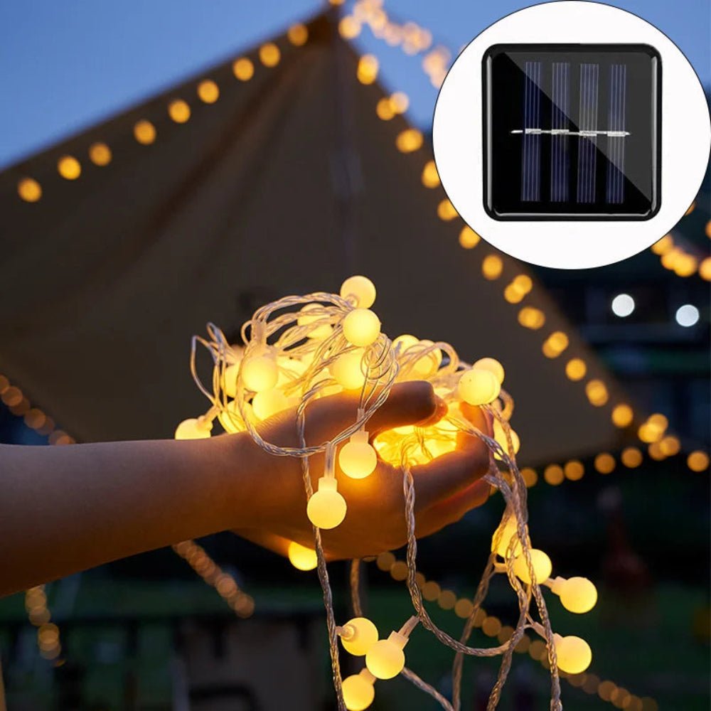 Solar LED string lights with automatic sensor, 10m length, waterproof design for outdoor garden decor, featuring warm white fairy lights ideal for creating a magical 2