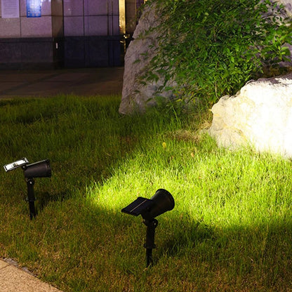 Solar powered spot lights featuring adjustable focus, available in warm white and multicolor options, ideal for outdoor accent lighting in gardens and patios. 2