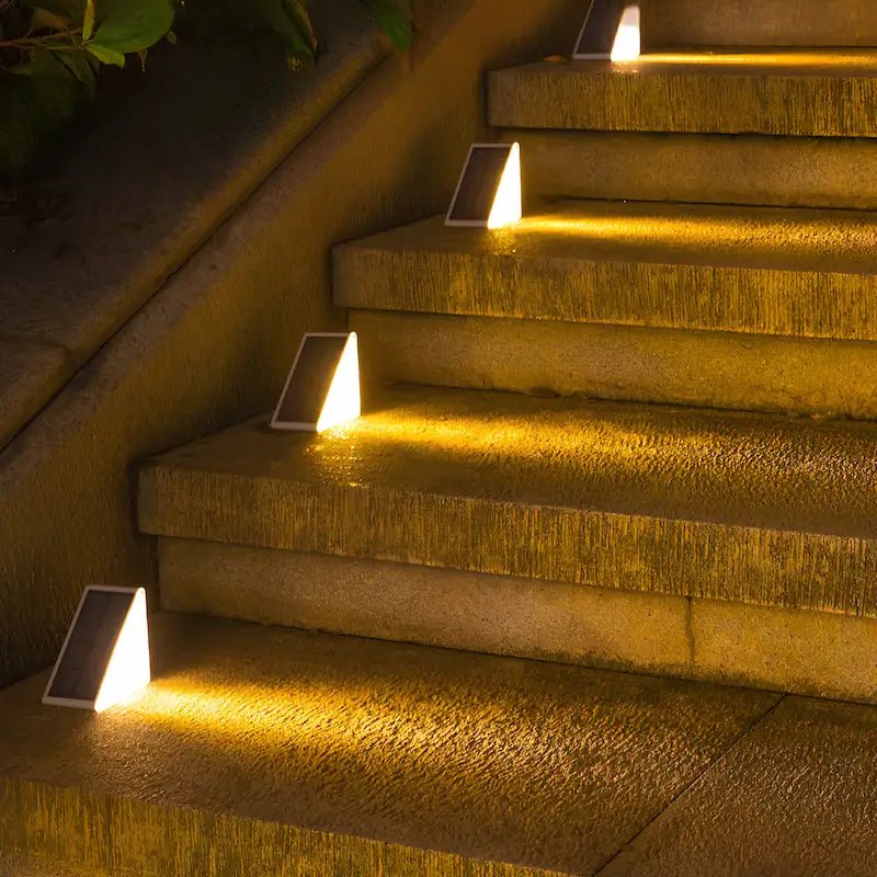 Solar stair lights designed for outdoor use, featuring automatic illumination for enhanced safety on pathways and gardens, compact design for easy installation. 2