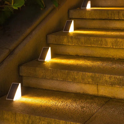 Solar stair lights designed for outdoor use, featuring automatic illumination for enhanced safety on pathways and gardens, compact design for easy installation. 2