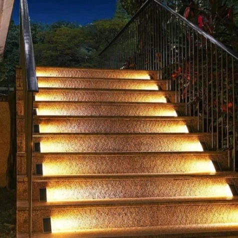 Solar stair lights designed for outdoor use, featuring automatic illumination for enhanced safety on pathways and gardens, compact design for easy installation. 1
