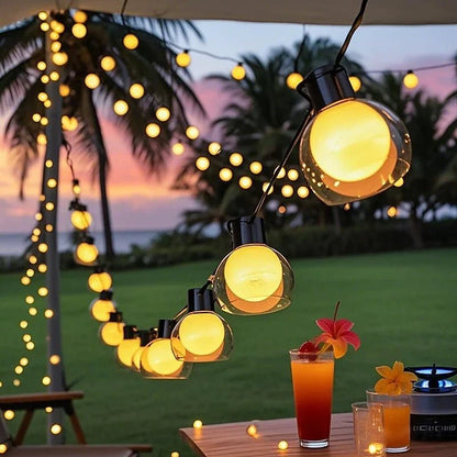 Solar string lights featuring warm white twinkle bulbs, perfect for outdoor decorative lighting in 16.4ft and 32.8ft lengths. 2