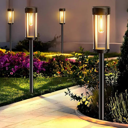 Solar torch lights outdoor with flickering flame effect, designed for garden and yard pathways, featuring a sleek black finish for stylish outdoor lighting. 3