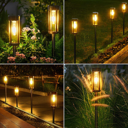 Solar torch lights outdoor with flickering flame effect, designed for garden and yard pathways, featuring a sleek black finish for stylish outdoor lighting. 2