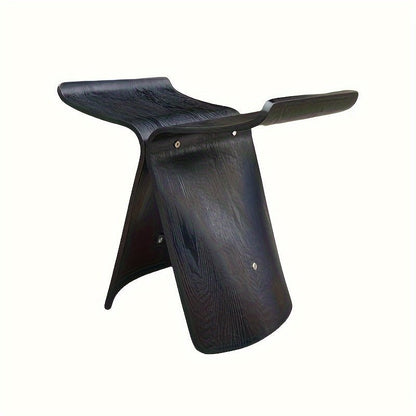 Solid wood butterfly stool with a natural finish, featuring a timeless design for compact and versatile seating in any space. 6