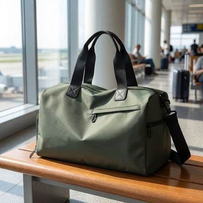 Spacious waterproof travel bag with adjustable strap, made from durable fabric, perfect for weekend getaways.

 1