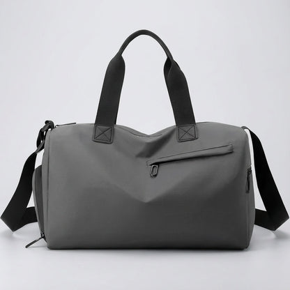 Spacious waterproof travel bag with adjustable strap, made from durable fabric, perfect for weekend getaways.

 5