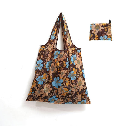 Square reusable tote bag made from lightweight, durable fabric, featuring a modern eco-friendly design, perfect for shopping and daily use. 13