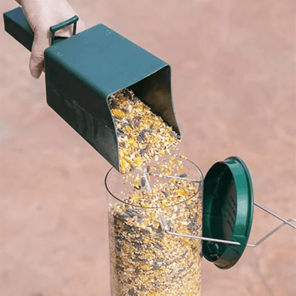 Squirrel-proof bird feeder featuring spinning action, made from durable metal and UV-stabilized polycarbonate for long-lasting outdoor use. 4