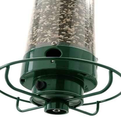 Squirrel-proof bird feeder featuring spinning action, made from durable metal and UV-stabilized polycarbonate for long-lasting outdoor use. 3