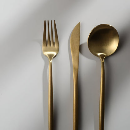 Stainless steel cutlery set featuring a modern minimalist design and ergonomic handles for comfortable use. 6
