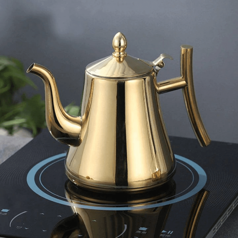 Stainless steel electric kettle with built-in filter and modern induction design, perfect for fast heating and brewing tea or coffee. 0