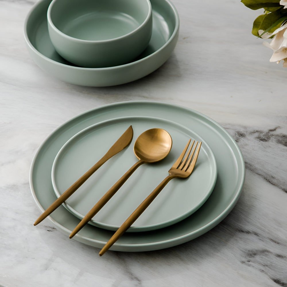 Stainless steel flatware set featuring a modern minimalist design, 30-piece collection, perfect for elegant dining, and dishwasher safe for easy cleaning. 6