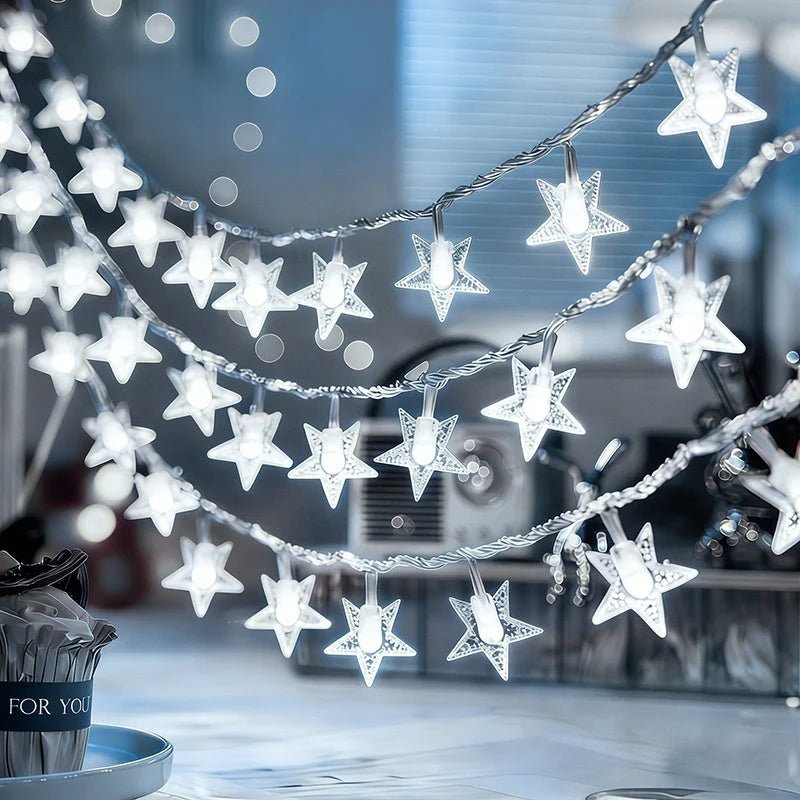 Multi-color LED star fairy string lights powered by batteries, perfect for adding a whimsical touch to any indoor or outdoor space. 1