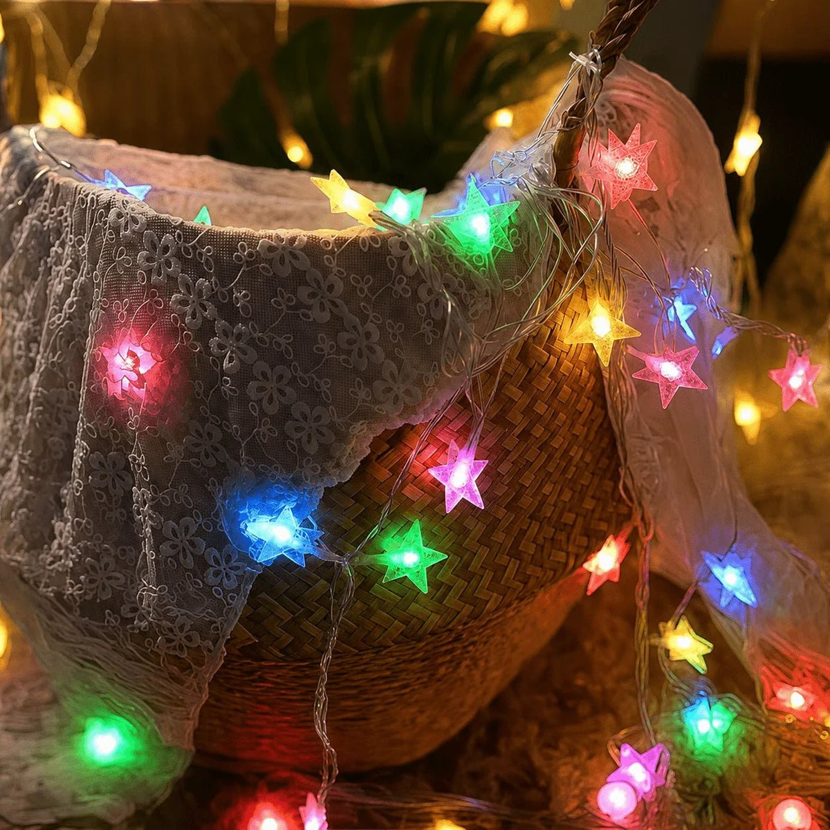 Multi-color LED star fairy string lights powered by batteries, perfect for adding a whimsical touch to any indoor or outdoor space. 4